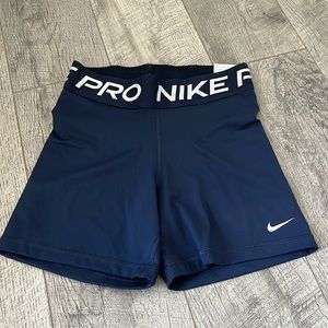 navy blue nike pros size s